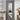 Full-length hanging mirror with rounded corners and dark frame