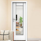 Over-door full-length mirror with slim black metal frame on a white door