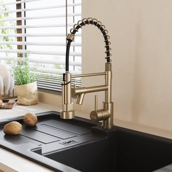 Kitchen faucet, brushed gold with black coiled hose and side spray handle