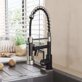 Gold stainless steel kitchen faucet with pull-down sprayer spraying water