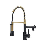 Gold kitchen faucet with black pull-down sprayer, arched spring hose, and lever controls
