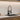 Gold and black kitchen faucet with pull-down sprayer over undermount sink