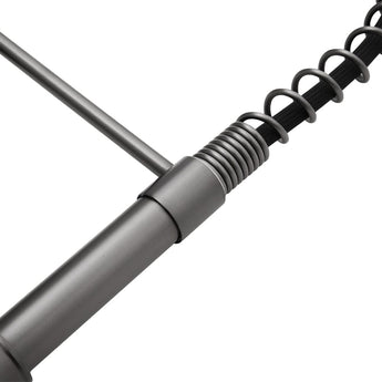 Grey faucet spring spout with coiled neck detail and braided hose section
