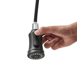 Grey faucet sprayer head with handle and finger control button