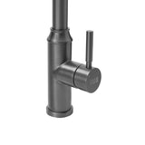 Grey single-handle kitchen faucet control lever and side-mounted sprayer outlet
