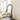 Black pull-down kitchen faucet with coiled hose spray head