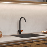 Black single-handle kitchen bar faucet with tall curved spout and side control