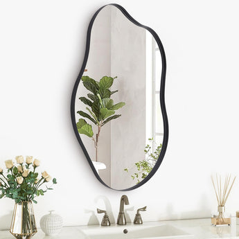 Irregular wall mirror with dark metal frame, tall rounded oval shape