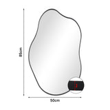 Irregular wall mirror, size 86cm x 50cm, dark metal frame, rounded shield shape