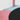 Pink padded rim and light-blue seat pad inside the safety net trampoline