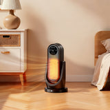 Ceramic space heater with glowing heating element, black base and top control panel