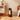 Ceramic space heater with glowing heating element, black base and top control panel