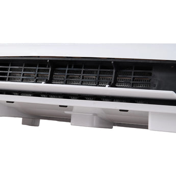Underside of white electric heater showing air vents and heating element grille