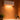 White wall-mounted PTC heater showing glowing heating slot and display '23'