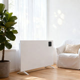 White convection heater with black control window and freestanding legs on floor