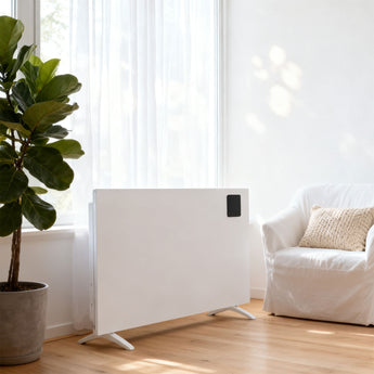 White convection heater with black control window and freestanding legs on floor