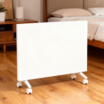 Close front view of white freestanding convection heater on rolling casters