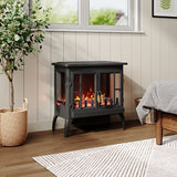 Freestanding black electric fireplace heater with LED flame effect behind glass panels
