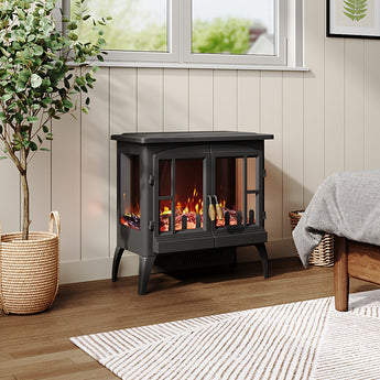 Freestanding black electric fireplace heater with LED flame effect behind glass panels