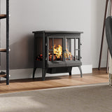 Black freestanding electric fireplace heater with enclosed flame window and logs