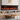 Black electric fireplace insert with red flame and log bed, 50/60 in.