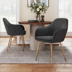 2 velvet dining chairs, dark gray, gold legs; padded seat and curved back