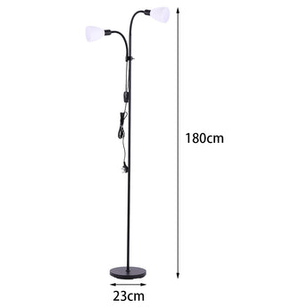 Double-headed black floor lamp with two white globe shades and round base
