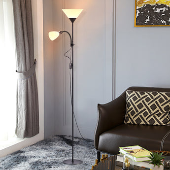 Double-head floor lamp with two fabric shades on a tall black metal pole