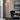 Double-head floor lamp with two fabric shades on a tall black metal pole