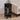 Black slim wooden console table with drawer and open lower shelf, crossed legs