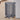 Grey freestanding pet gate, 4 panels with vertical bars and foldable base feet