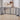 Grey 4-panel wooden pet gate, freestanding with vertical slats and corner brackets