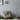 Arched floor lamp with grey fabric shade and marble-look base, 131–186 cm