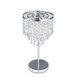 Small crystal table lamp with round chrome base and dangling clear prisms shade