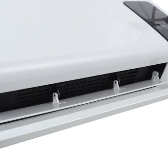 Close-up of wall-mounted heater vent grille and internal airflow openings