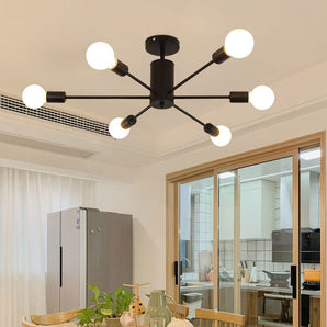 Industrial 6-light ceiling fixture with black round canopy and six white globe bulbs