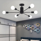 6-light ceiling light: black center canopy with six white bulbs on curved metal arms