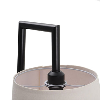 Close-up of lampshade socket area with black mounting tube on floor lamp.