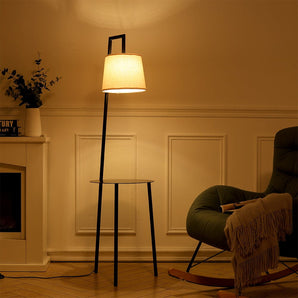 Metal tray table floor lamp with linen shade, black frame, round side tray base.