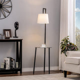 Tall floor lamp with linen lampshade and round tray table, black metal frame.