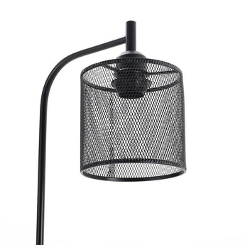 View of black mesh lampshade cylinder on industrial floor light