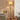 Black 2-head floor lamp with fabric shades and adjustable arms, standing base