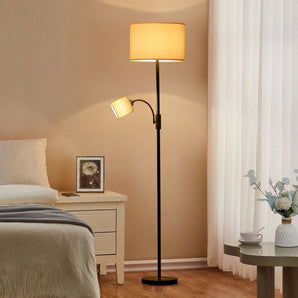 Black 2-head floor lamp with fabric shades and adjustable arms, standing base