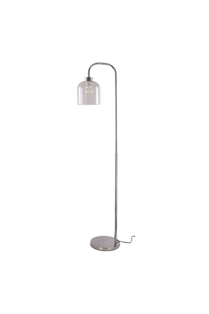 Floor lamp on round base with tall metal stem and small clear glass bell shade