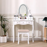 White vanity desk with oval mirror and drawers, includes cushioned stool