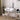 White makeup vanity table set with lighted mirror, open storage, and padded stool