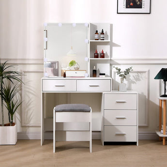 White vanity table with large lighted mirror, drawers and matching cushioned stool