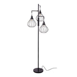 Black industrial 3-light floor lamp with wire cage shades and slender pole base