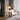 Amber glass dome shade floor lamp with arched metal stand and side table shelf