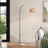 Woven bamboo dome lampshade on arched floor lamp with marble base